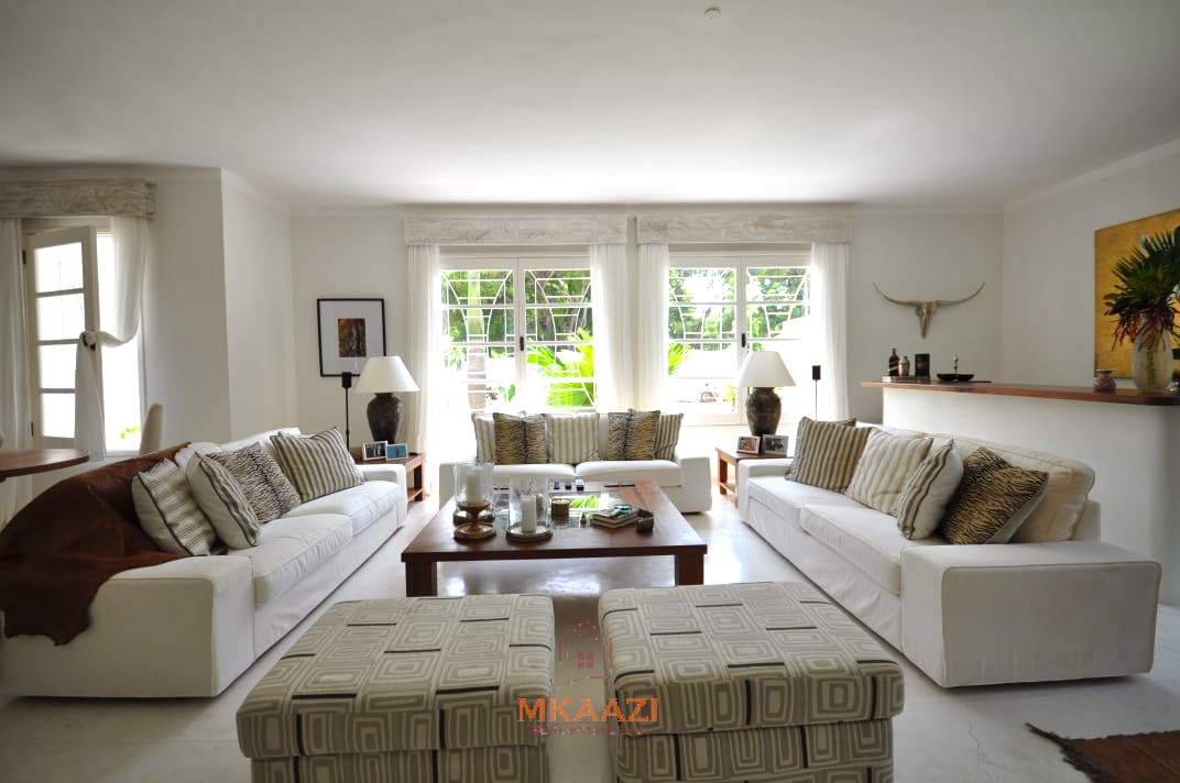 Luxury 4-bedroom villa for sale in Malindi near Casuarina Road with pool, landscaped gardens, staff quarters, and high-end finishes on 1.25 acres.