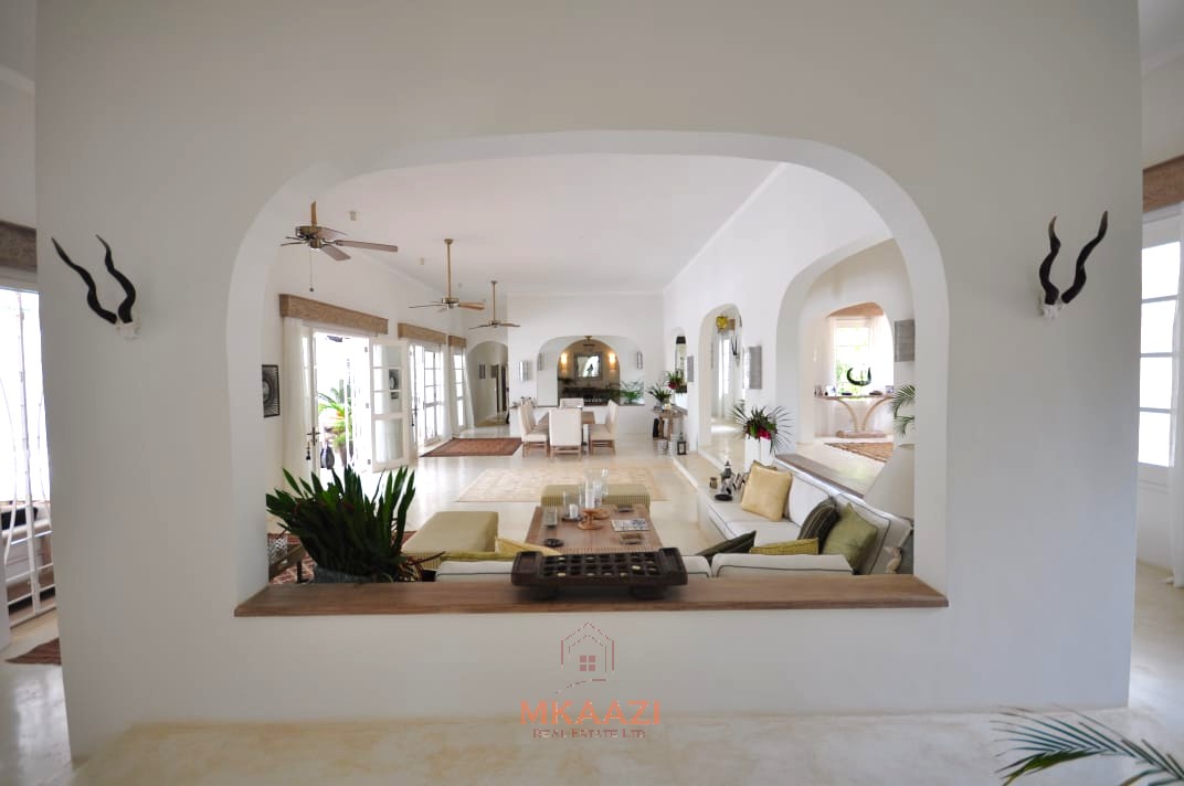 Luxury 4-bedroom villa for sale in Malindi near Casuarina Road with pool, landscaped gardens, staff quarters, and high-end finishes on 1.25 acres.