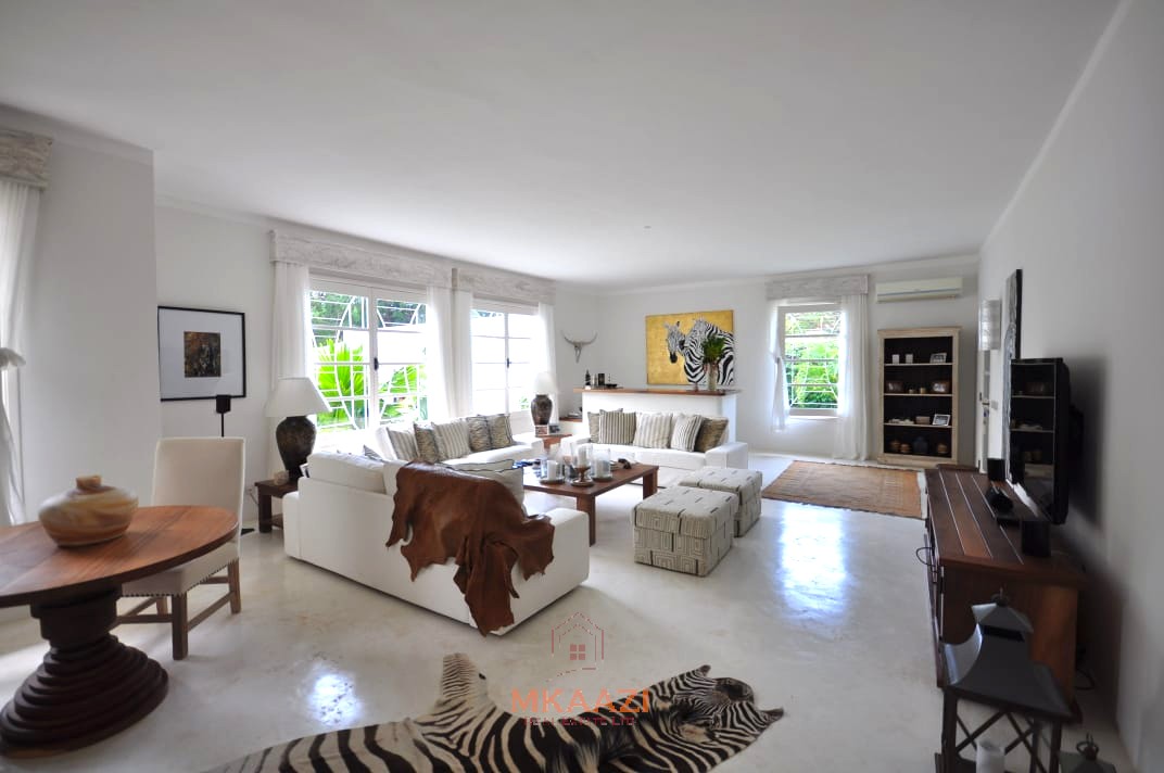 Luxury 4-bedroom villa for sale in Malindi near Casuarina Road with pool, landscaped gardens, staff quarters, and high-end finishes on 1.25 acres.