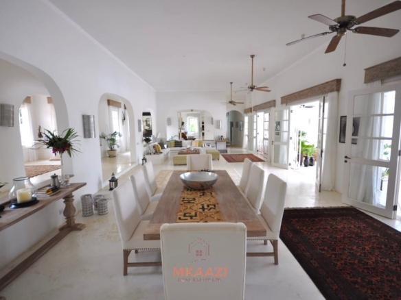 Luxury 4-bedroom villa for sale in Malindi near Casuarina Road with pool, landscaped gardens, staff quarters, and high-end finishes on 1.25 acres.