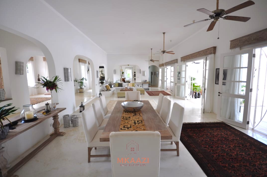 Luxury 4-bedroom villa for sale in Malindi near Casuarina Road with pool, landscaped gardens, staff quarters, and high-end finishes on 1.25 acres.