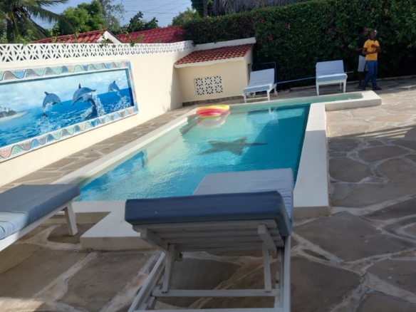 Fully furnished 3 bedroom ocean view villa for sale in Turtle Bay Watamu on quarter acre near beach with DSQ and garage