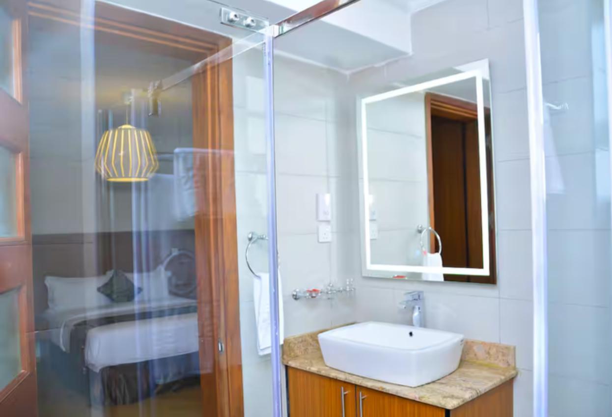 Fully furnished 2-bedroom executive suite with pool and gym in Nairobi UN Blue Zone near Fourways Estate.