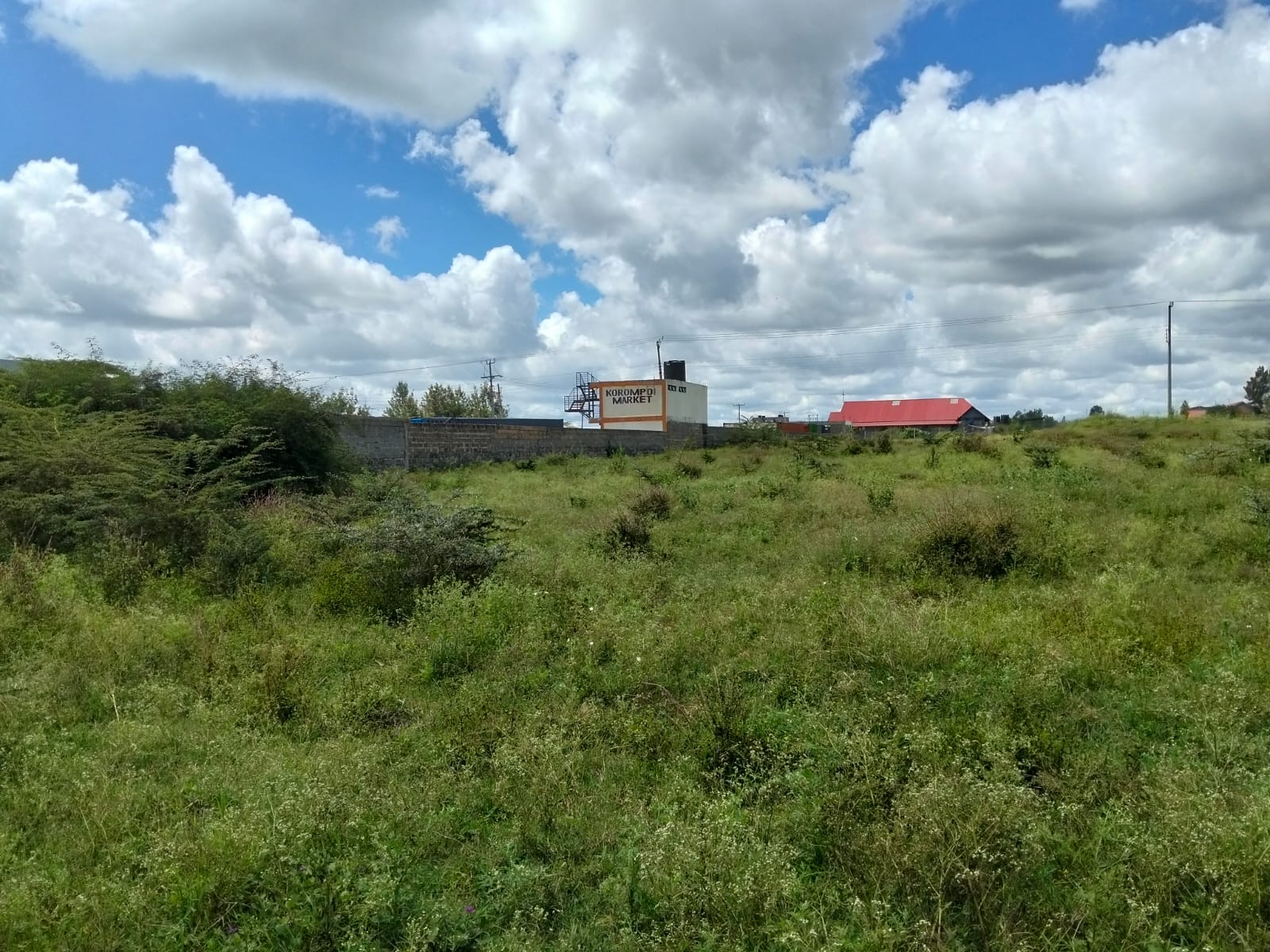Prime 1-acre roadfront commercial and industrial land for sale along Nairobi Namanga Road in Kitengela with ready title deed.