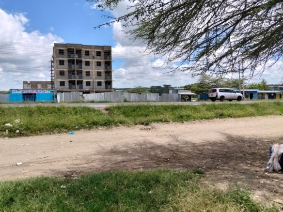 Prime 1-acre roadfront commercial and industrial land for sale along Nairobi Namanga Road in Kitengela with ready title deed.