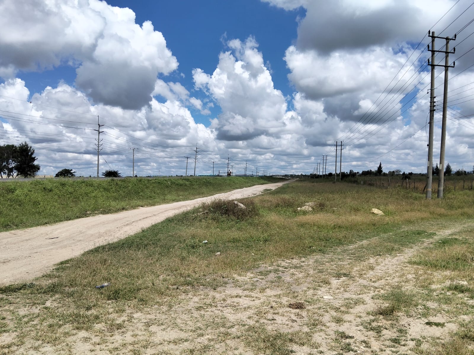 Prime 50-acre road frontage land for sale in Kitengela Kisaju ideal for industrial, commercial, residential estate, and mixed-use development with ready title deed.