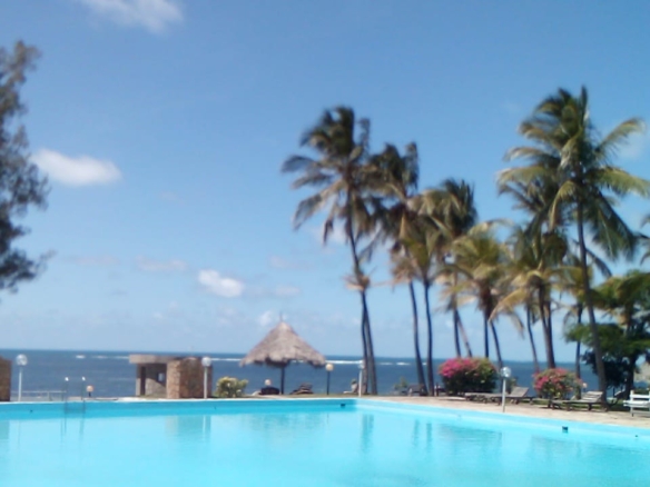 Beachfront 1 bedroom apartment for sale in Oasis Village Malindi with ocean and pool views