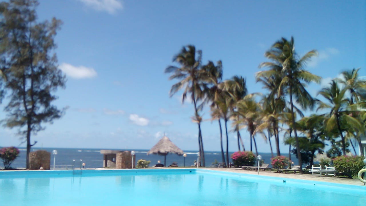 Beachfront 1 bedroom apartment for sale in Oasis Village Malindi with ocean and pool views