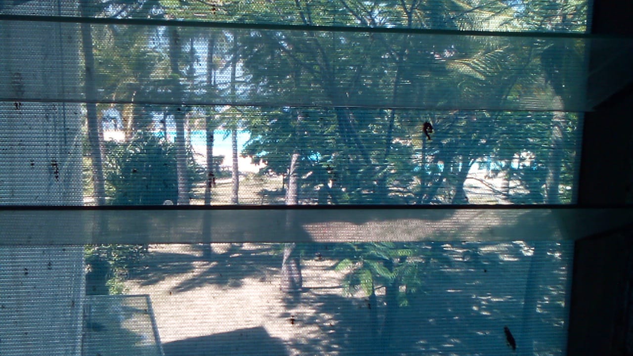 Beachfront 1 bedroom apartment for sale in Oasis Village Malindi with ocean and pool views