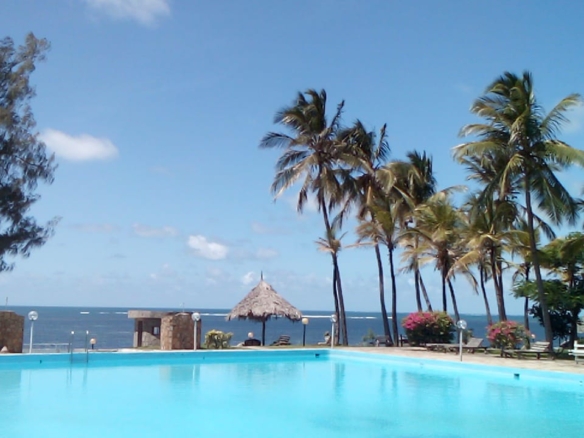 Luxury beachfront 2-bedroom apartment for short stay in Oasis Village Malindi with ocean views, swimming pool, secure parking, and 24/7 security.