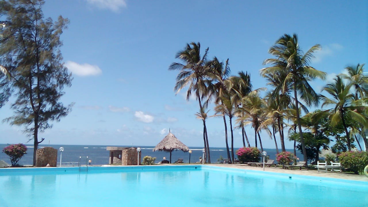 Luxury beachfront 2-bedroom apartment for short stay in Oasis Village Malindi with ocean views, swimming pool, secure parking, and 24/7 security.