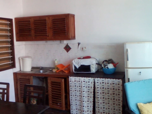 Beachfront 1 bedroom apartment for sale in Oasis Village Malindi with ocean and pool views