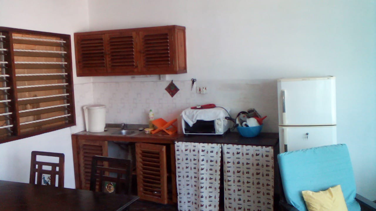 Beachfront 1 bedroom apartment for sale in Oasis Village Malindi with ocean and pool views