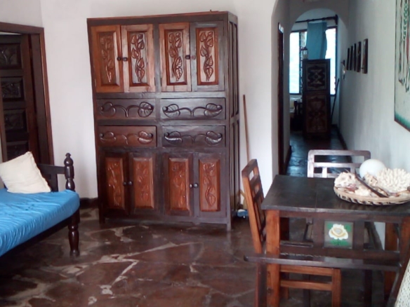 Beachfront 1 bedroom apartment for sale in Oasis Village Malindi with ocean and pool views