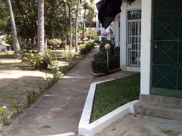Beachfront 1 bedroom apartment for sale in Oasis Village Malindi with ocean and pool views