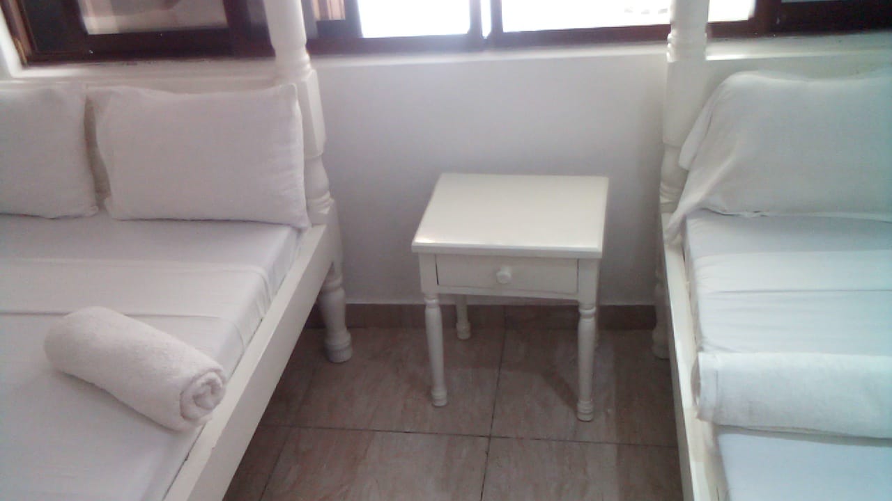 Luxury beachfront 2-bedroom apartment for short stay in Oasis Village Malindi with ocean views, swimming pool, secure parking, and 24/7 security.