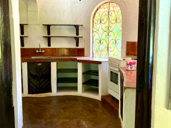 Partially furnished home for rent in P.K Estate Malindi with private pool, outdoor sitting area, SQ, and storage near Lamu Road.