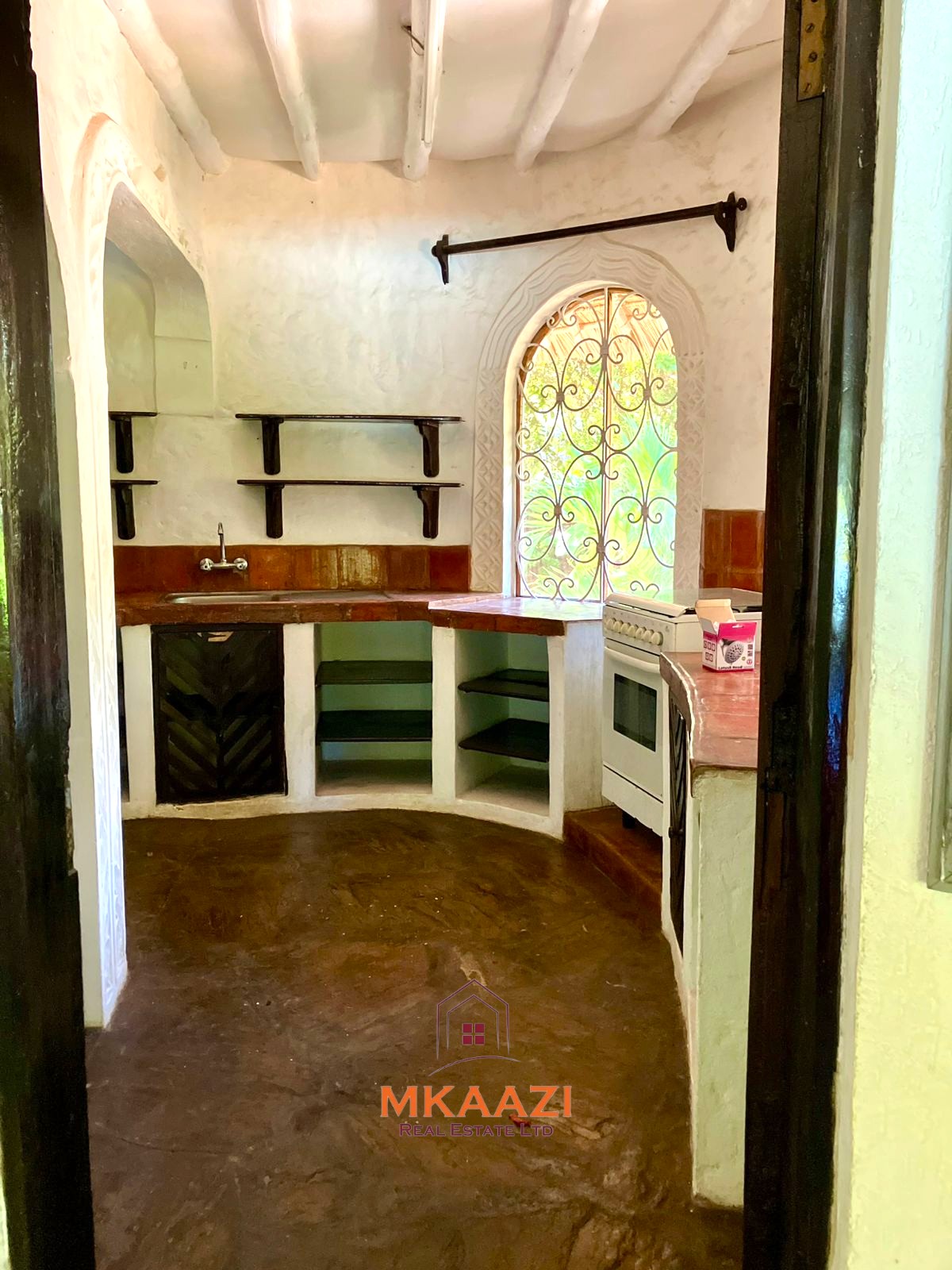 Partially furnished home for rent in P.K Estate Malindi with private pool, outdoor sitting area, SQ, and storage near Lamu Road.