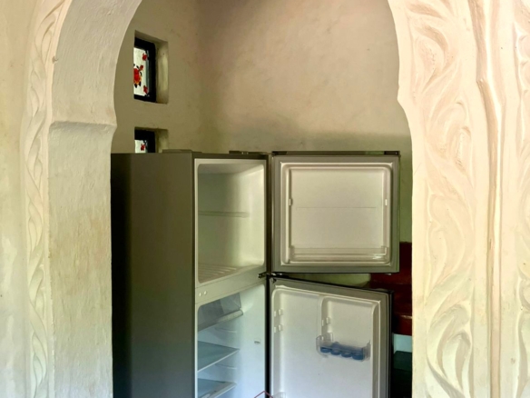 Partially furnished home for rent in P.K Estate Malindi with private pool, outdoor sitting area, SQ, and storage near Lamu Road.
