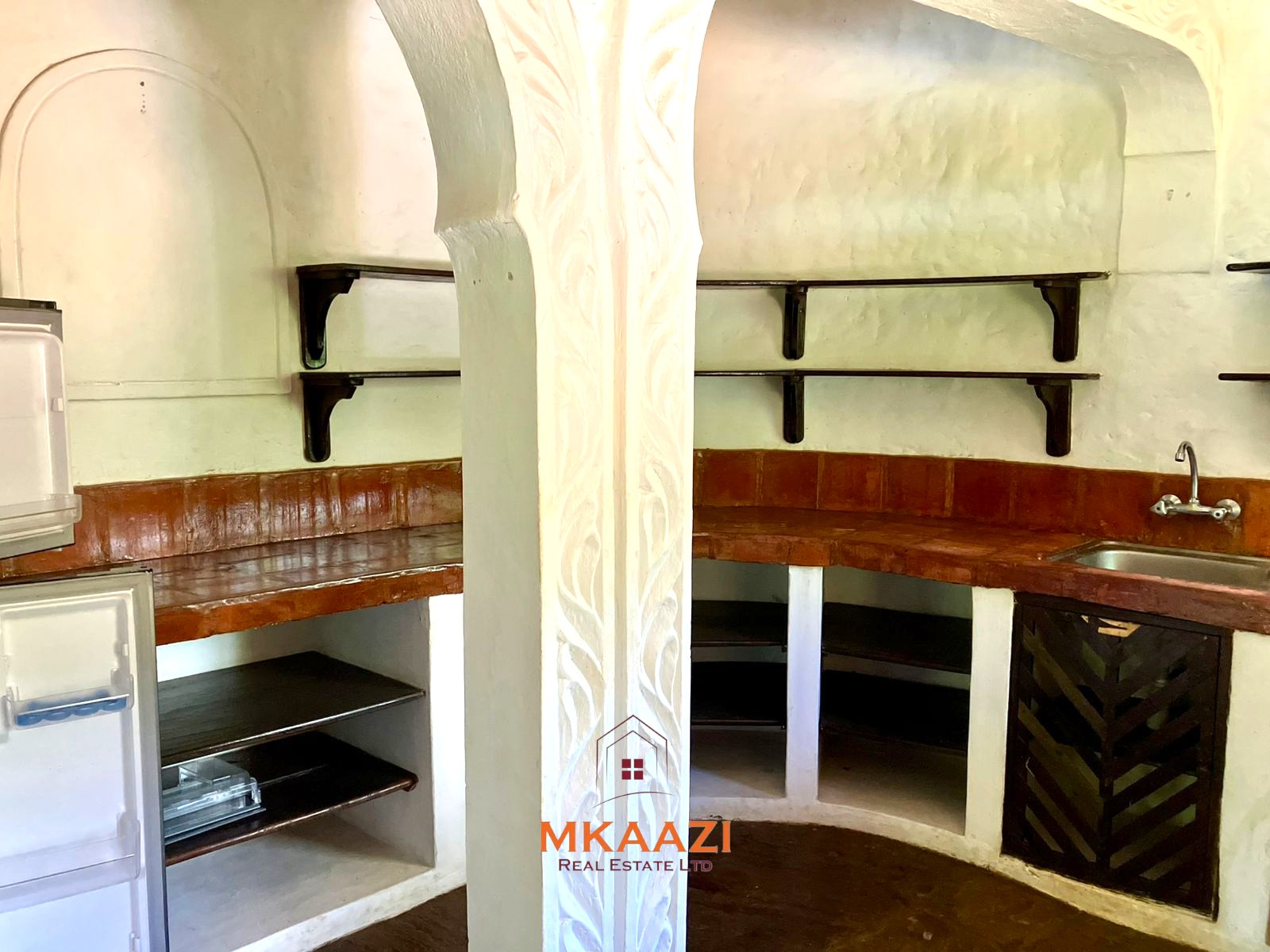 Partially furnished home for rent in P.K Estate Malindi with private pool, outdoor sitting area, SQ, and storage near Lamu Road.