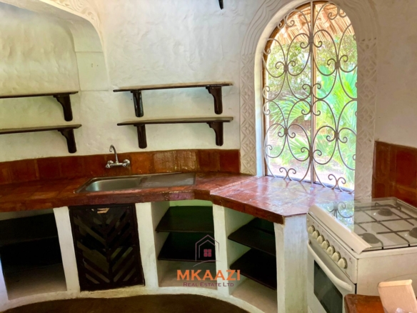 Partially furnished home for rent in P.K Estate Malindi with private pool, outdoor sitting area, SQ, and storage near Lamu Road.