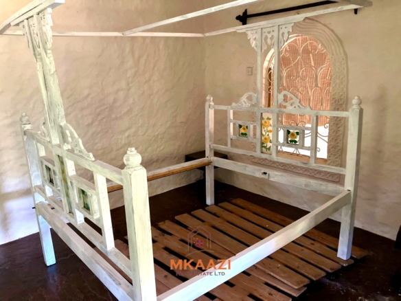 Partially furnished home for rent in P.K Estate Malindi with private pool, outdoor sitting area, SQ, and storage near Lamu Road.