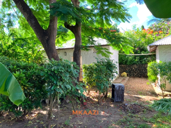 Partially furnished home for rent in P.K Estate Malindi with private pool, outdoor sitting area, SQ, and storage near Lamu Road.