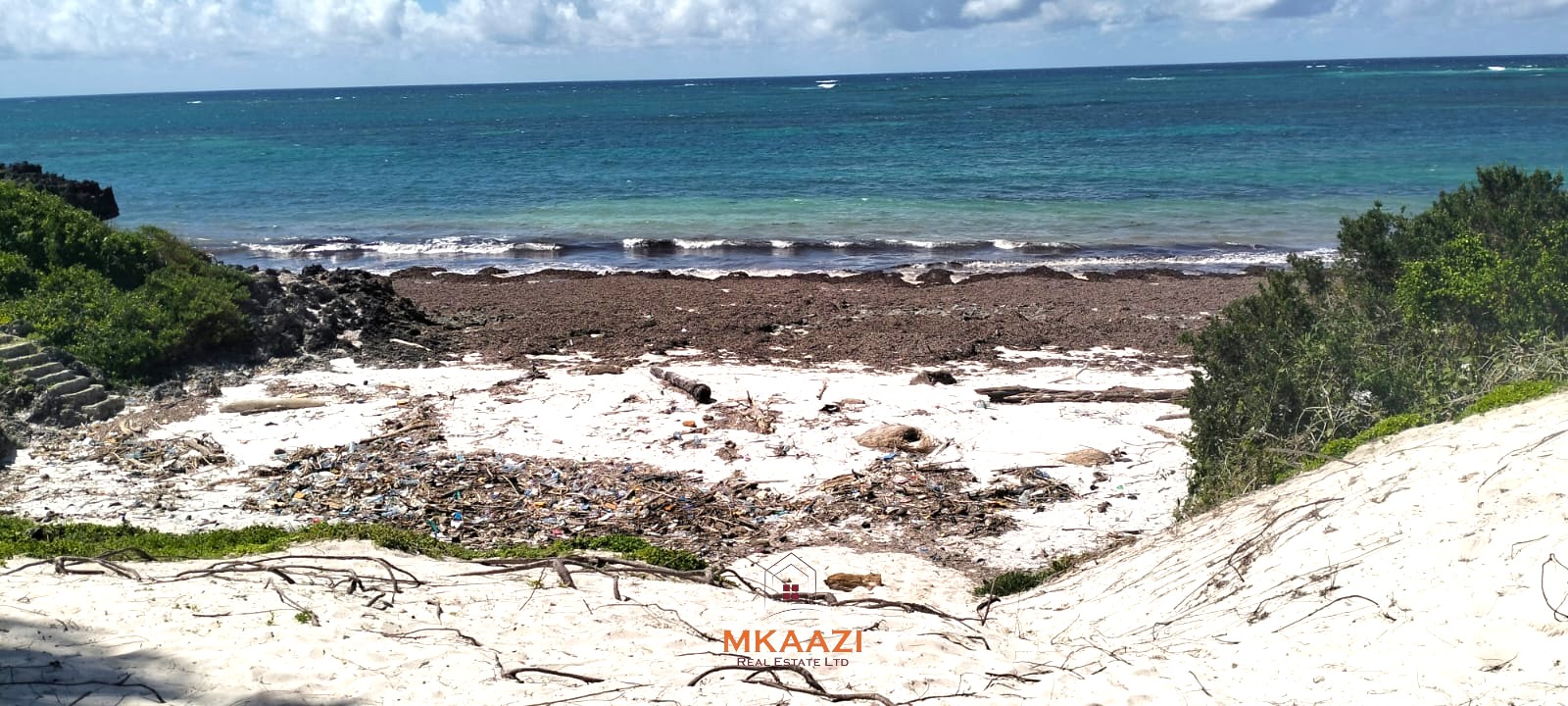 5-acre beachfront land for sale in Uyombo featuring sandy beachfront access, freehold title deed, coral bedrock foundation, and prime investment potential along Kenya’s North Coast.