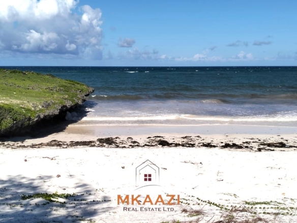 35-acre beachfront land for sale in Chumani featuring pristine white sandy beaches, panoramic ocean views, freehold title, and exceptional investment potential.
