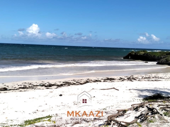 35-acre beachfront land for sale in Chumani featuring pristine white sandy beaches, panoramic ocean views, freehold title, and exceptional investment potential.