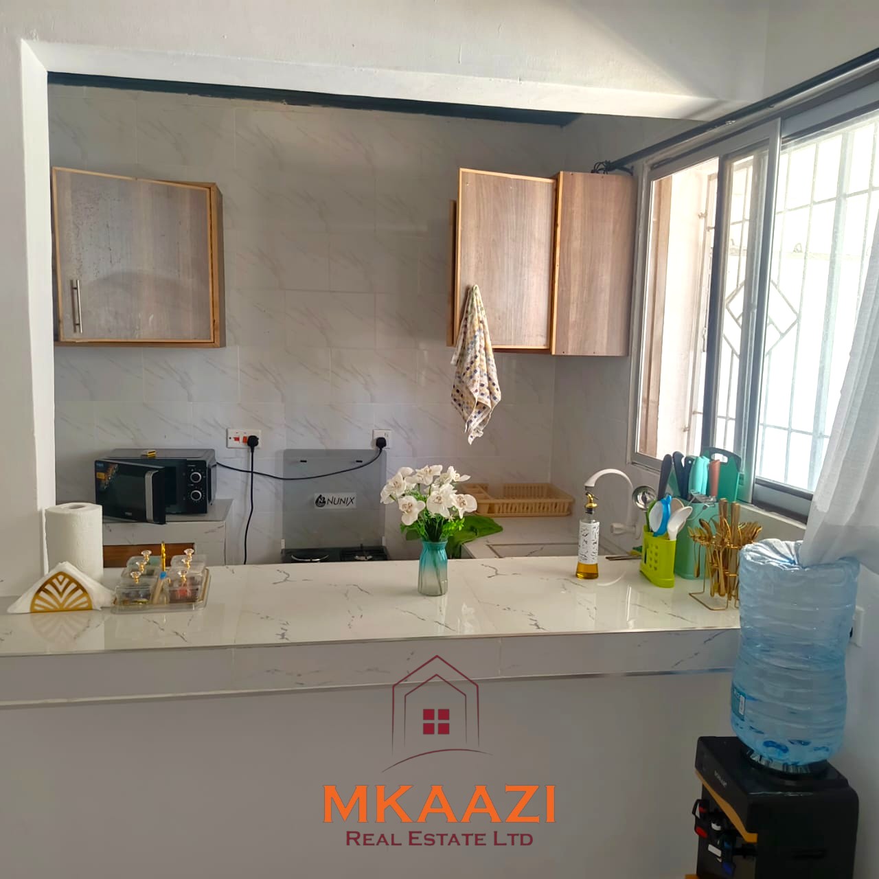 Modern 1-bedroom furnished apartment in Malindi with WiFi, Netflix, parking, and easy access to the beach and airport.