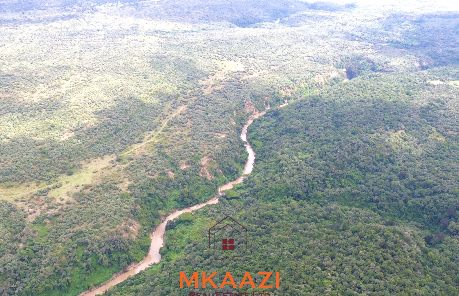 Luxury 1,800-acre ranch for sale in Naivasha featuring wildlife conservancy, river frontage, private airstrip, luxury cottages, and eco-tourism investment potential.