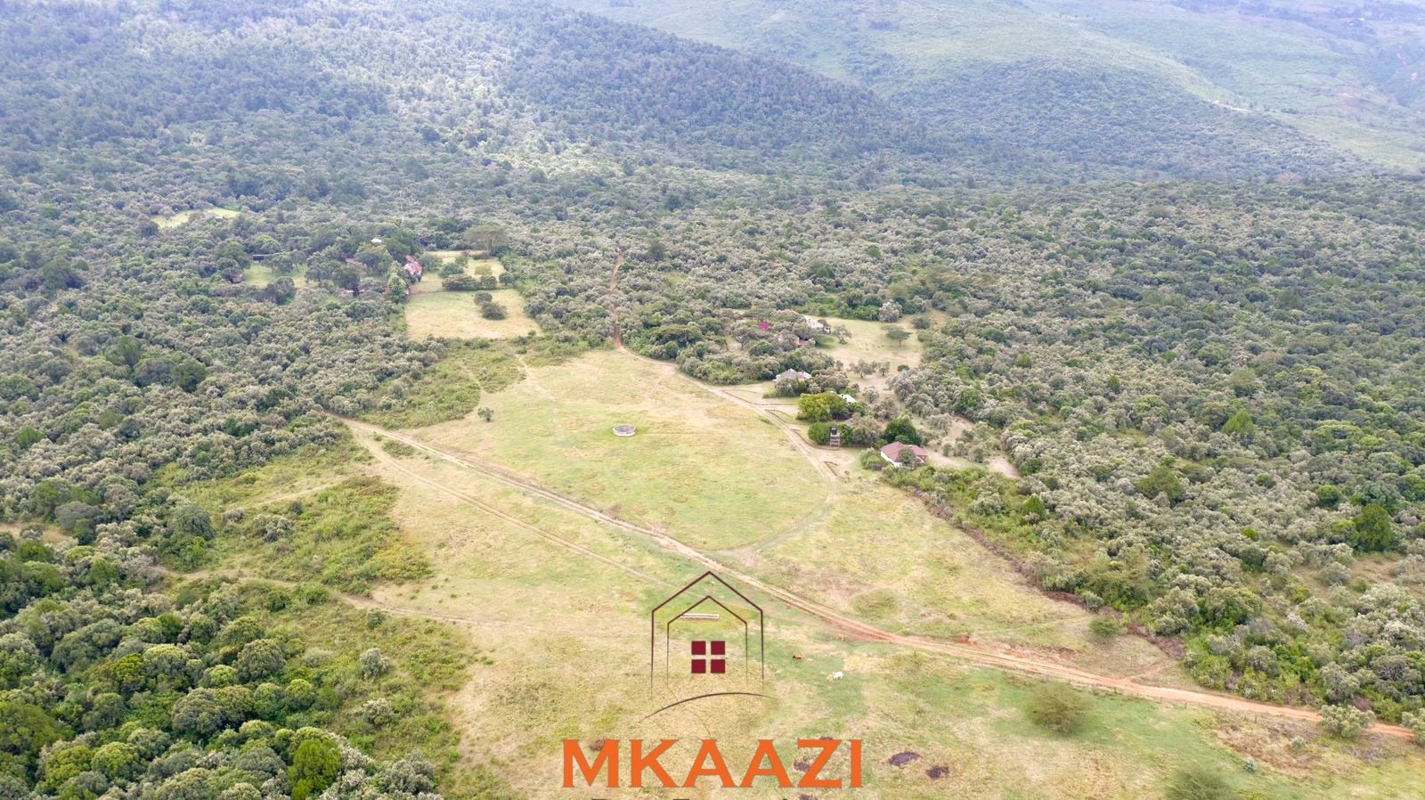 Luxury 1,800-acre ranch for sale in Naivasha featuring wildlife conservancy, river frontage, private airstrip, luxury cottages, and eco-tourism investment potential.