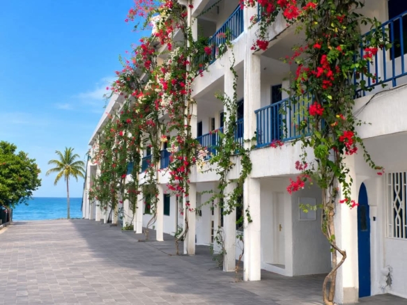 Beachfront 1 bedroom apartment for sale in Oasis Village Malindi with ocean and pool views
