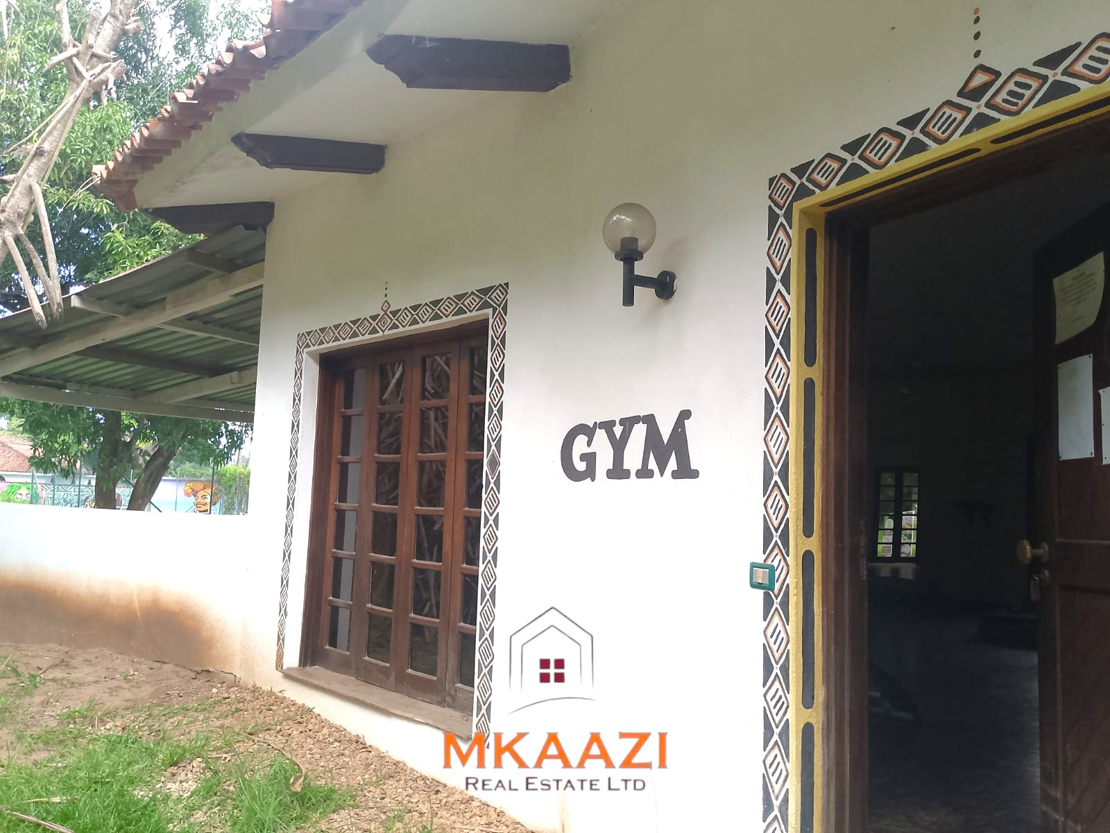 Luxury 2-bedroom apartment for sale at Mwembe Resort Malindi with pools, gym, spa, balcony, and resort amenities.