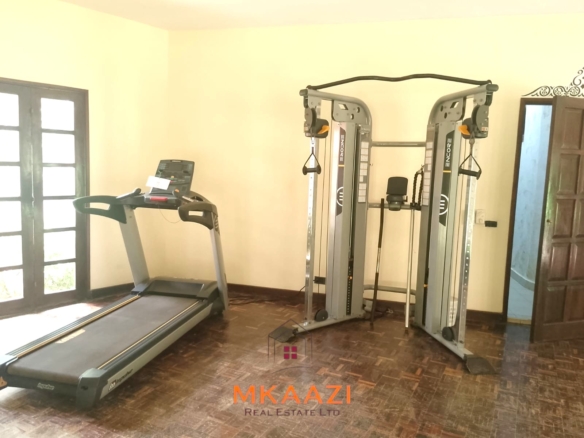 Luxury 2-bedroom apartment for sale at Mwembe Resort Malindi with pools, gym, spa, balcony, and resort amenities.