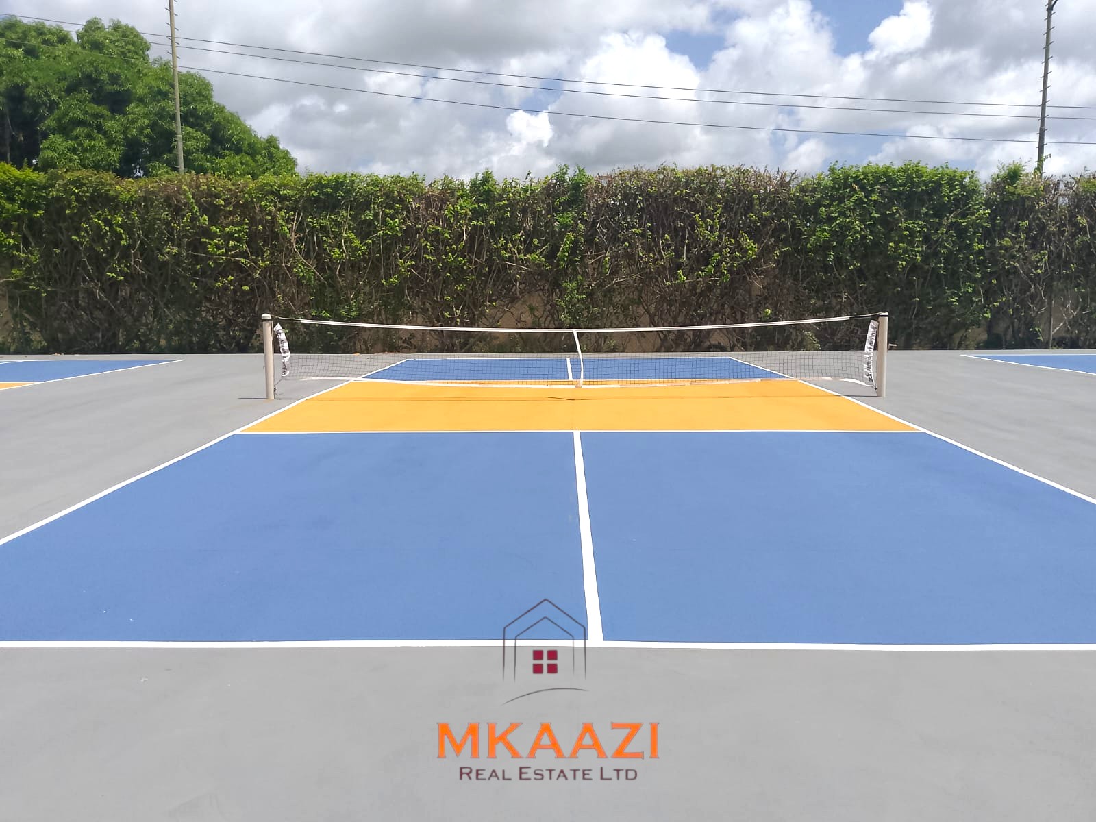 Luxury 2-bedroom apartment for sale at Mwembe Resort Malindi with pools, gym, spa, balcony, and resort amenities.