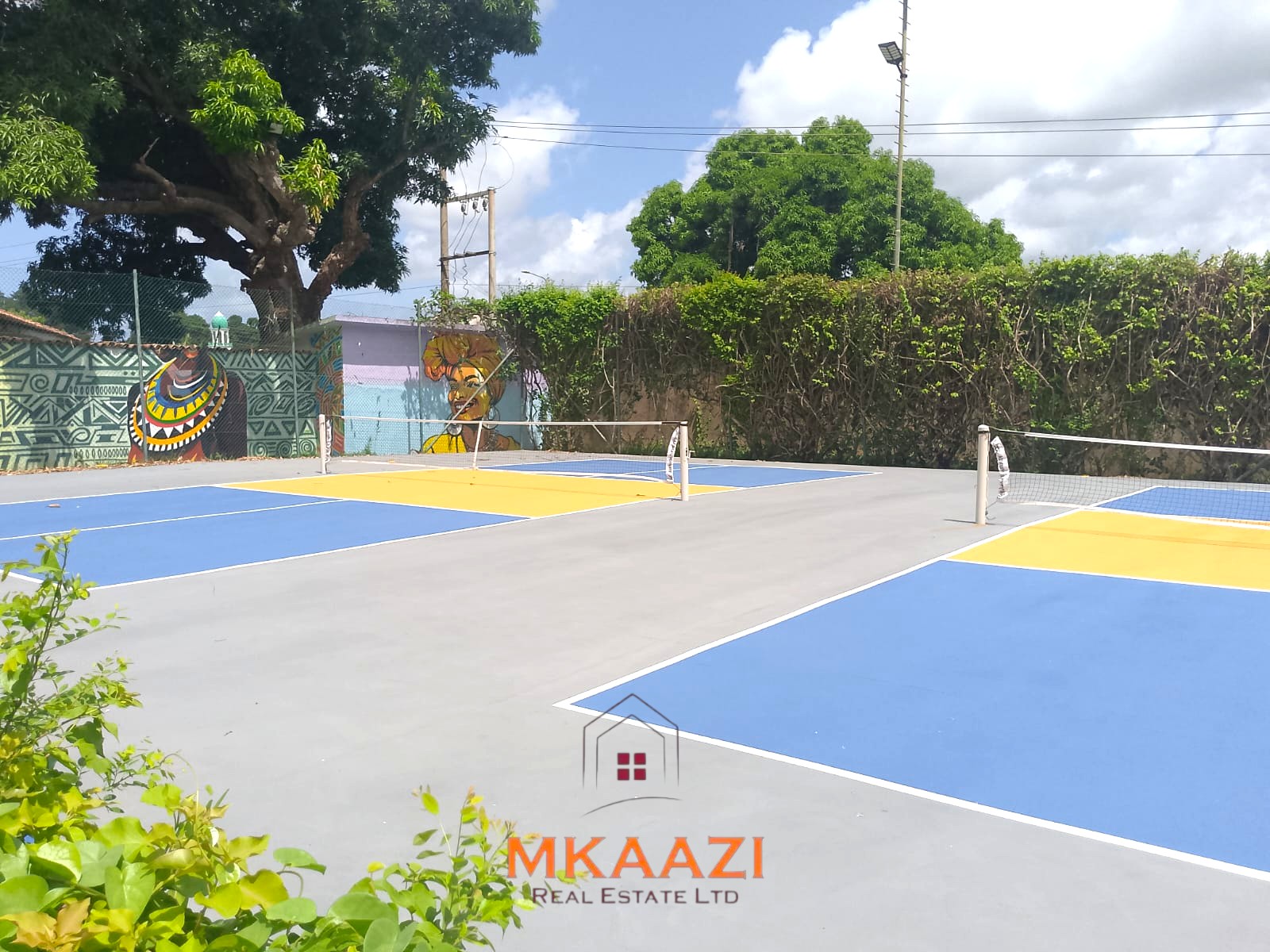 Luxury 2-bedroom apartment for sale at Mwembe Resort Malindi with pools, gym, spa, balcony, and resort amenities.