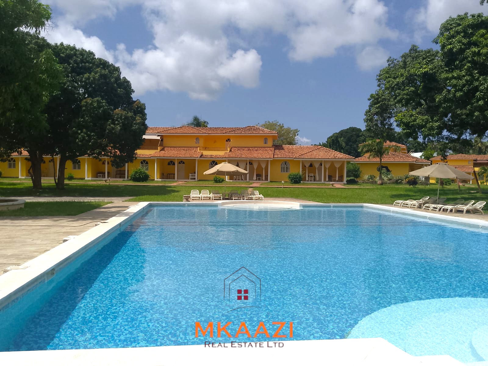 Luxury 2-bedroom apartment for sale at Mwembe Resort Malindi with pools, gym, spa, balcony, and resort amenities.