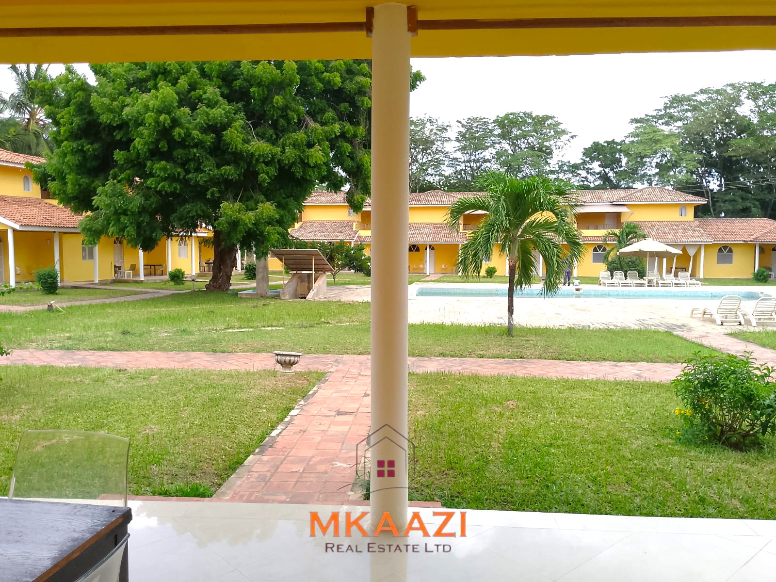 Luxury 2-bedroom apartment for sale at Mwembe Resort Malindi with pools, gym, spa, balcony, and resort amenities.