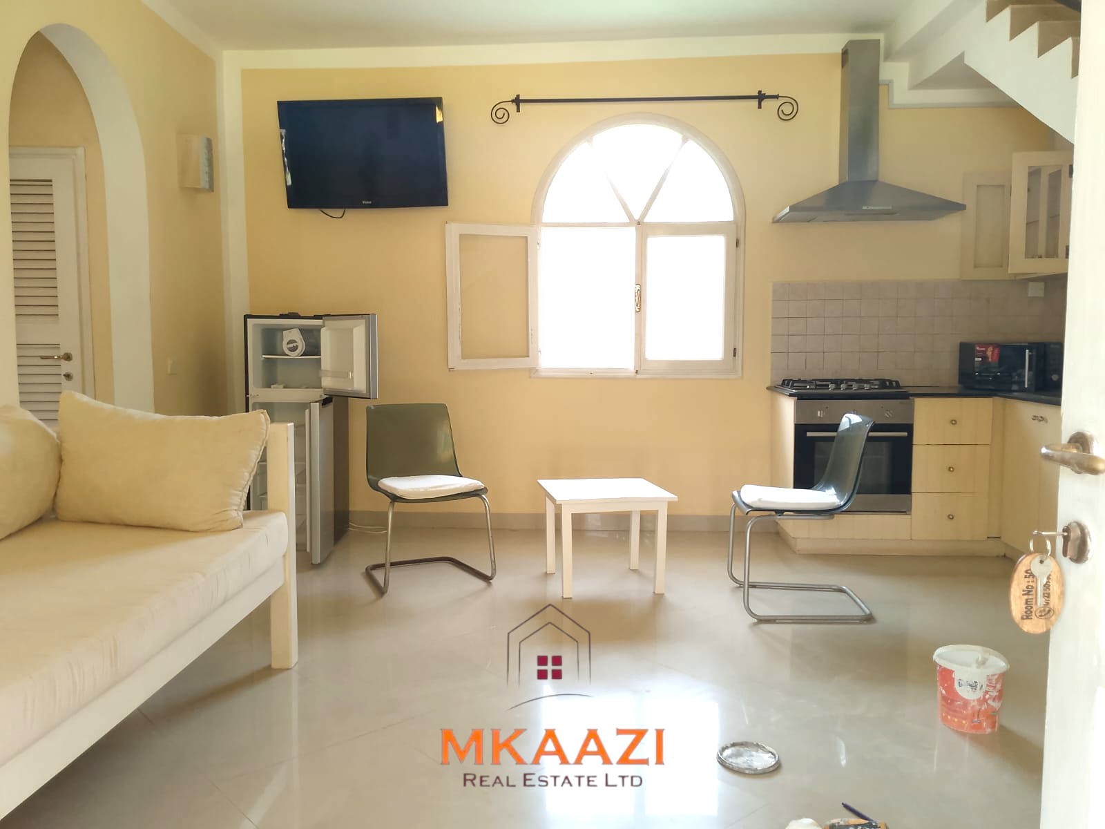Luxury 2-bedroom apartment for sale at Mwembe Resort Malindi with pools, gym, spa, balcony, and resort amenities.