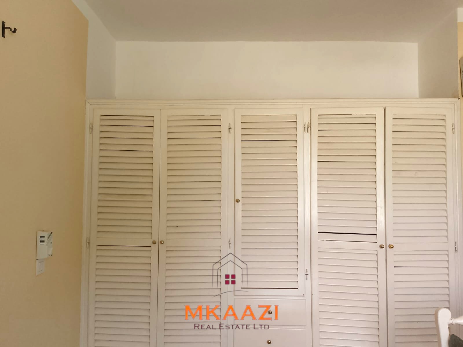 Luxury 2-bedroom apartment for sale at Mwembe Resort Malindi with pools, gym, spa, balcony, and resort amenities.
