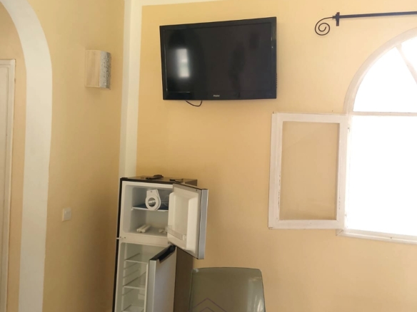 Luxury 2-bedroom apartment for sale at Mwembe Resort Malindi with pools, gym, spa, balcony, and resort amenities.