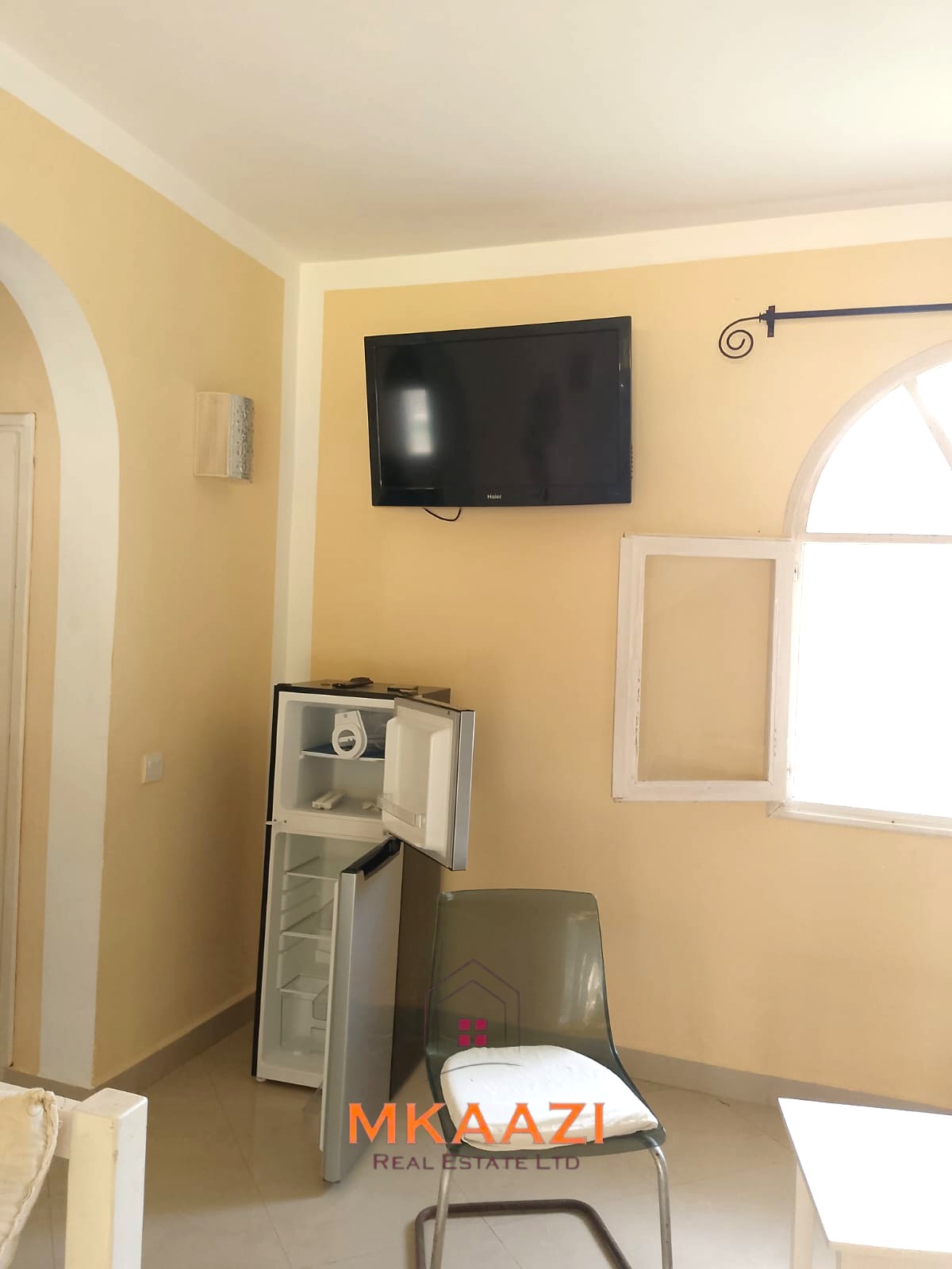 Luxury 2-bedroom apartment for sale at Mwembe Resort Malindi with pools, gym, spa, balcony, and resort amenities.