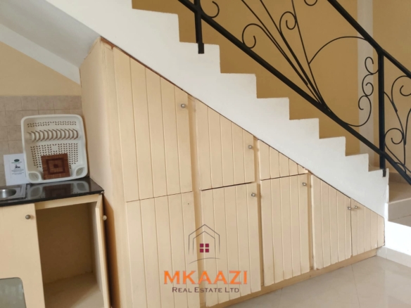 Luxury 2-bedroom apartment for sale at Mwembe Resort Malindi with pools, gym, spa, balcony, and resort amenities.