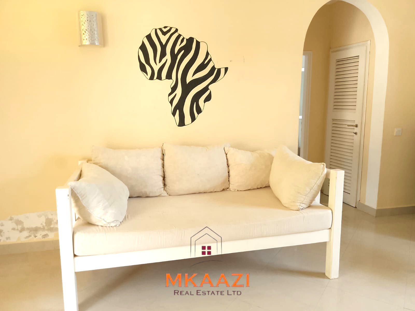 Luxury 2-bedroom apartment for sale at Mwembe Resort Malindi with pools, gym, spa, balcony, and resort amenities.