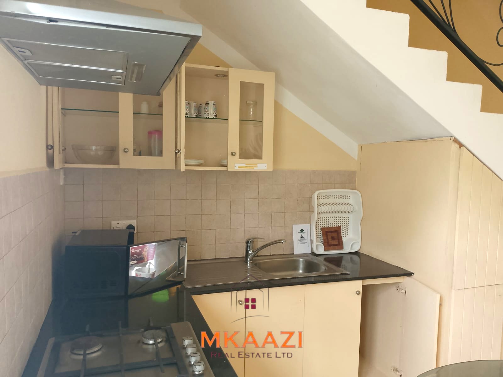 Luxury 2-bedroom apartment for sale at Mwembe Resort Malindi with pools, gym, spa, balcony, and resort amenities.