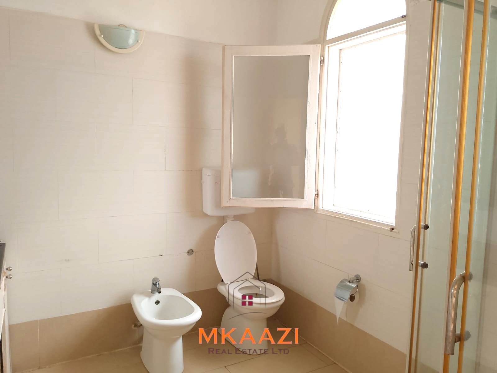 Luxury 2-bedroom apartment for sale at Mwembe Resort Malindi with pools, gym, spa, balcony, and resort amenities.