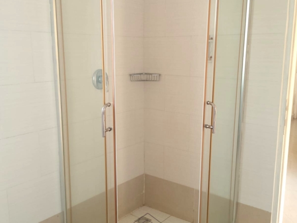 Luxury 2-bedroom apartment for sale at Mwembe Resort Malindi with pools, gym, spa, balcony, and resort amenities.