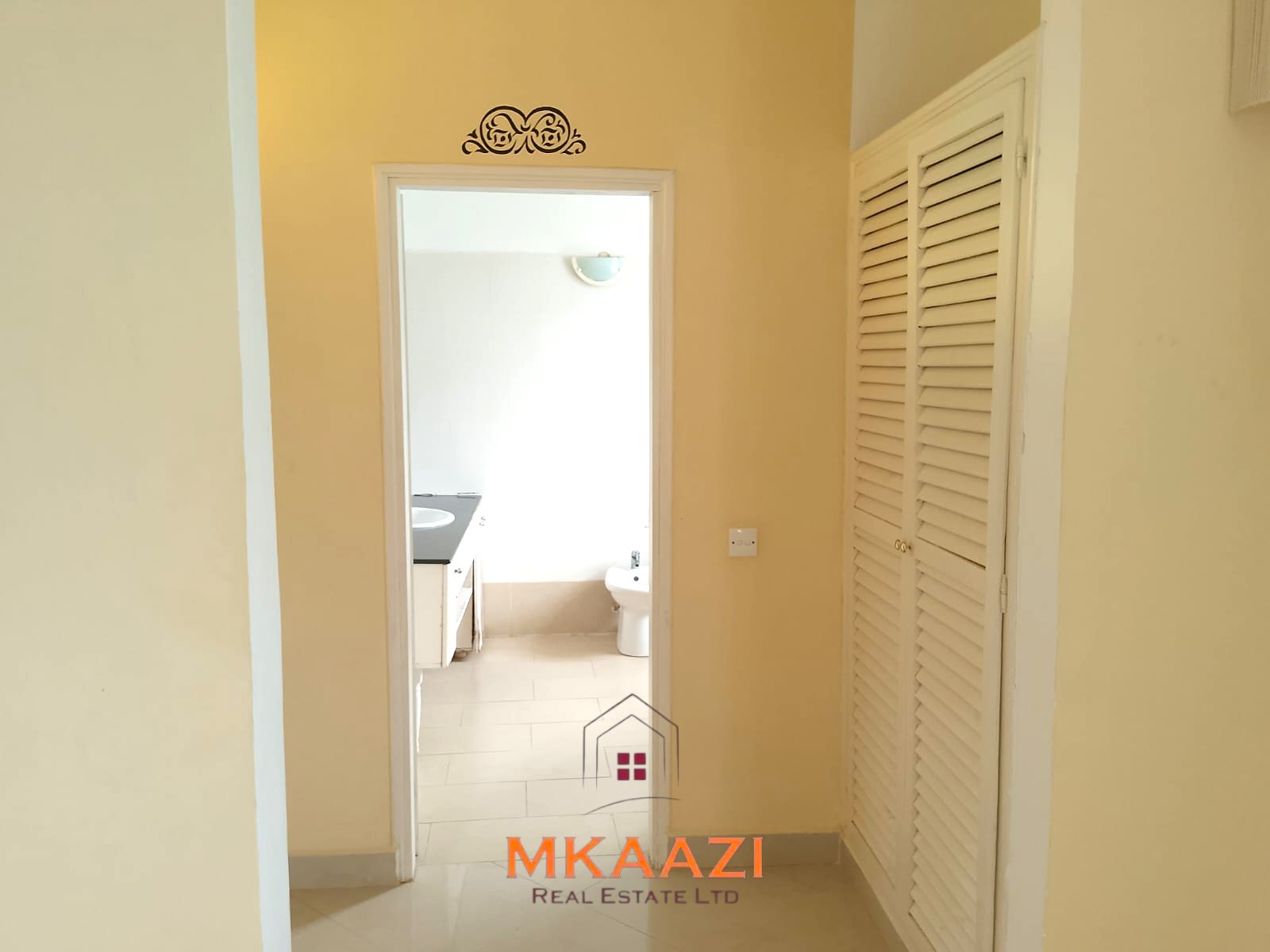 Luxury 2-bedroom apartment for sale at Mwembe Resort Malindi with pools, gym, spa, balcony, and resort amenities.